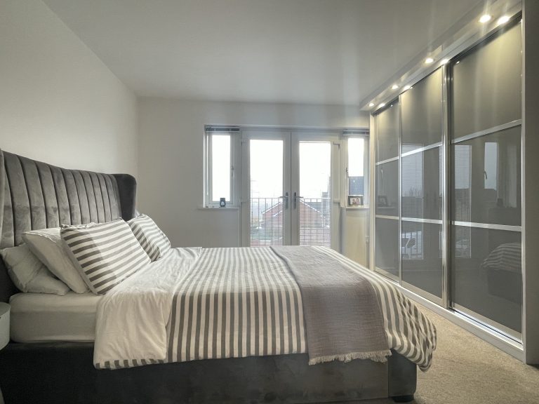 Storm grey sliding wardrobes in Sheffield by James Kilner